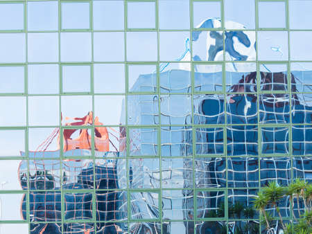 Glass reflection colored. Reflection in glass office buildingの写真素材