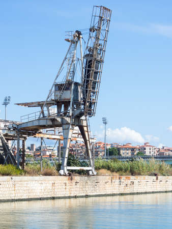 Waterway industrial warehouse wharf. Waterway in Cagliariの写真素材