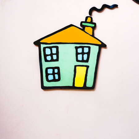 cottage applied on a wall. Small application to the wall of a small houseの写真素材