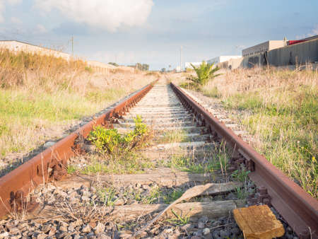 track for the infinite. Railway in abandoned placeの写真素材