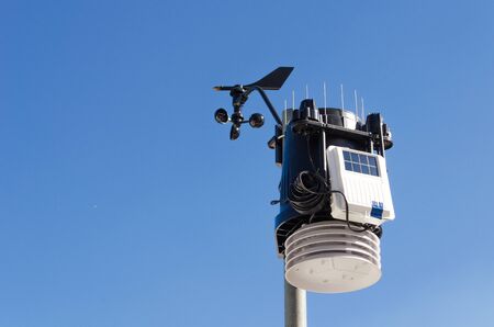 anemometer meteorology kit, wind meter with blue sky.の写真素材