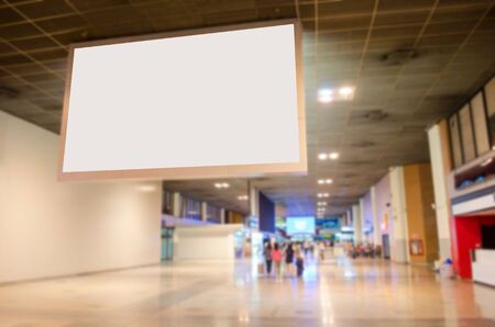 blank billboard with empty copy space in the airport for new advertisement with blurred interior airport background.の写真素材