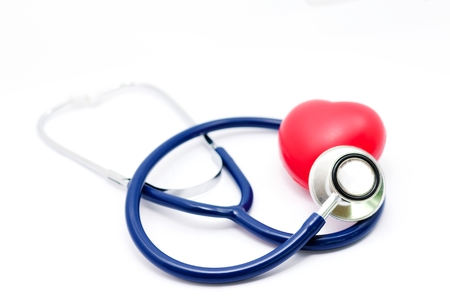 red heart and a stethoscope on white background, health care medical technology concept, soft focus, selective focus.の写真素材