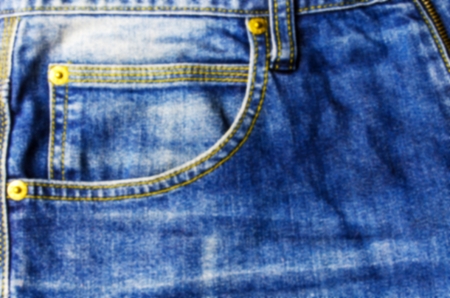 close up view of front pocket vintage blue denim jeans pant fashion, texture background, selective focusの写真素材