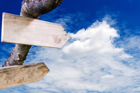 empty blank wooden signs or billboard for text with blue sky and cloud, selective focus, copy spaceの写真素材