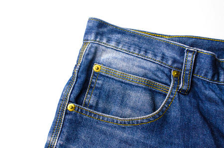 close up view of front pocket vintage blue denim jeans pant fashion isolated on white background, texture background, selective focusの写真素材