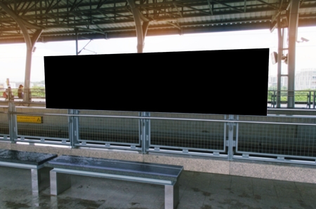 blank black advertising billboard with copy space for your text message or media and content at sky train station, commercial, marketing and advertising conceptの写真素材