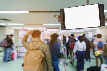 security camera and television blank screen or billboard, copy space for advertising or display media and content with people queue at immigration control in airport, commercial and marketing conceptの写真素材
