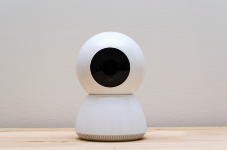 white web camera or webcam on desk with white wall background, object, internet, technology conceptの写真素材