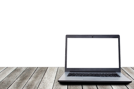 laptop computer with blank screen for presentation on wooden desk isolated on white background, workspace, technology, internet and business conceptの写真素材