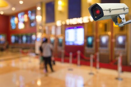 CCTV, security indoor camera system operating at movie theater, surveillance security and safety technology conceptの写真素材