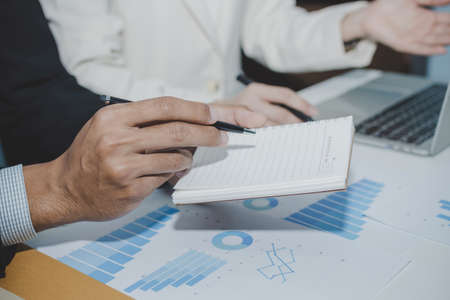 group business people meeting and planning about strategy finance business with document report on desk in meeting room office, partner, leadership, brainstorming, company meeting, financial conceptの写真素材