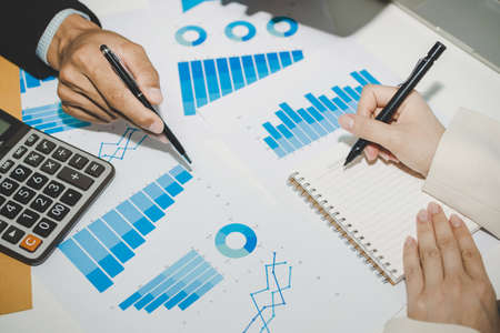 group business people meeting and planning about strategy finance business with document report on desk in meeting room office, partner, leadership, brainstorming, company meeting, financial conceptの写真素材