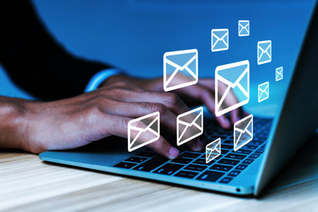 Hard Work. business people hand working on laptop computer and send email on desk at home office with icon diagram, social network, mail, digital marketing, internet, connection technology conceptの写真素材