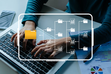 document management system. business hand using laptop computer with virtual graphic icon on desk at home, digital marketing, cloud computing, business finance, internet network technology conceptの写真素材