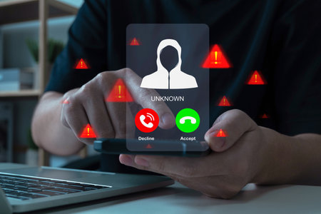 Cybersecurity. people hand using mobile phone with warning messages icon alert, virus protection software, cyber, business finance, malware attack warning, internet network technology conceptの写真素材