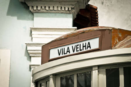 Old tram car and architectual features of an old buildingの写真素材