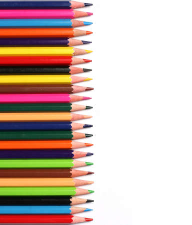 Multi Color pencils on white background の写真素材