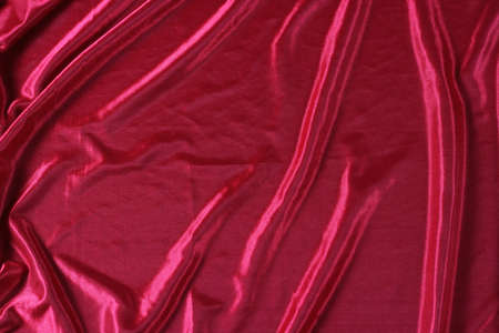 shiny red satin fabric background の写真素材