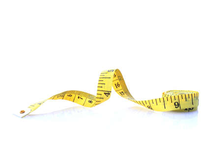 Yellow tailor meter on white, with reflectionの写真素材