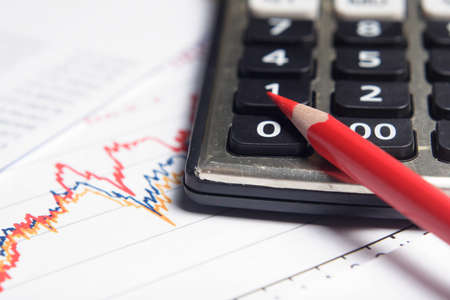 business chart, red pencil, calculatorの写真素材