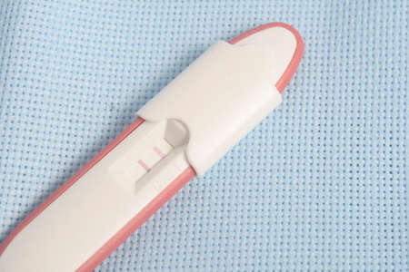 Pregnancy Test Pack At Pink Backgroundの写真素材