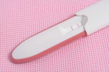 Pregnancy Test Pack At Pink Backgroundの写真素材