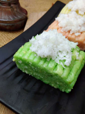 Getuk, Indonesia Traditional Snack Food, made from Steamed Cassava and grated coconut for Topping