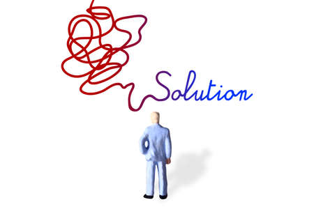 Photo Illustration, miniature figure toy with complicated way to finding solution