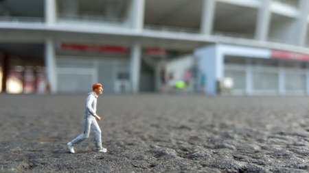 Running Mini Figure man in the morning, at Gelora Bung Karno Stadiumの写真素材