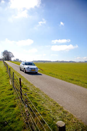 EMMELOORD, THE NETHERLANDS - MARCH 19, 2011. Rally car racing at  Dutch championship with driver Matthieu Tak, Co-driver Martin Nortier, Opel Astra GSI on March 19, 2011 in Emmeloord, The Netherlands.のeditorial素材
