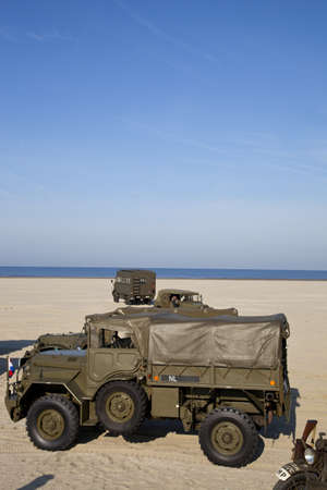 IJMUIDEN, THE NETHERLANDS-MAY 5:Kelly's Heroes Army jeeps and trucks on beach on May 5,2011 in IJmuiden, The Netherlands. Organization Kelly's Heroes celebrates liberation of The Netherlands in 1945のeditorial素材