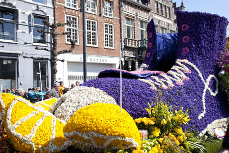 HAARLEM, THE NETHERLANDS - APRIL 21 2013  Shoe with flowers at flower parade on April 21 2013 in Haarlem, The Netherlands  The annual flower parade is a unique event with one million visitors  のeditorial素材