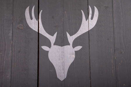 Illustration of reindeer on wooden backgroundの写真素材