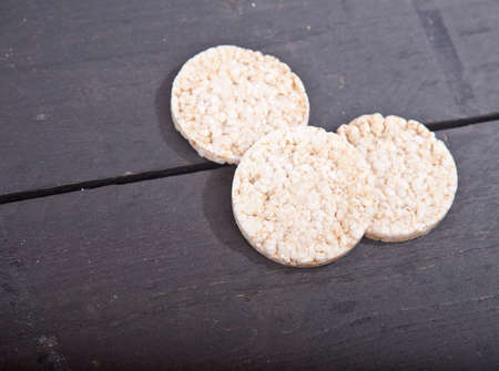 White rice waffles on wooden background