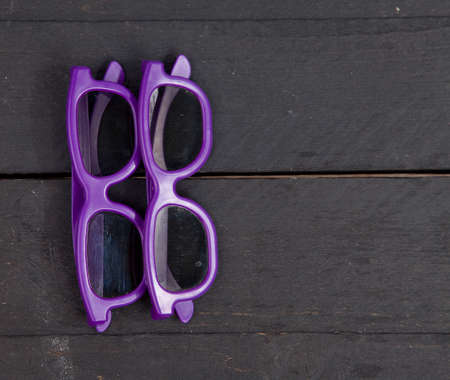 Two 3d glasses on wooden backgroundの写真素材