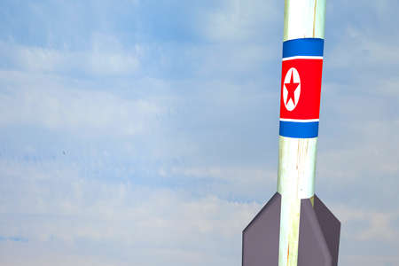 3d render of a missile with flag of North Koreaの写真素材