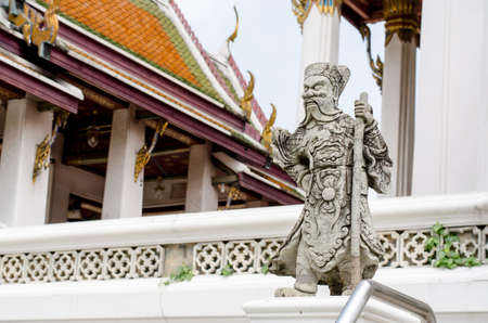 The chinese guardian angry statue in thai temple: public place
