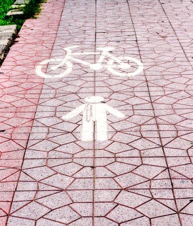 bycicle path on sidewalk in thailand: improve poor lighting and compositionの写真素材