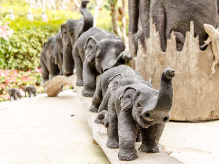 Elephant made from wood in gardenの写真素材