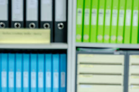 abstract blur background of row of binders in an office archiveの写真素材