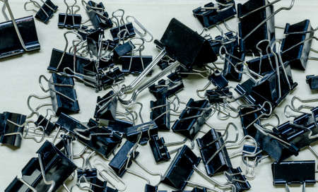 Close-up of binder clips in office boxの写真素材
