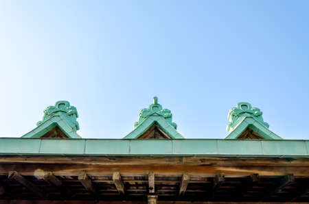 gable apex on blue sky with cloudの写真素材