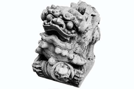 The stone sculpture of a lion gate guardian of the templeの写真素材