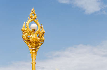 Golden lamp at Wat Phra That Phanom Nakhon Phanom Province northeastern Thailand.の写真素材