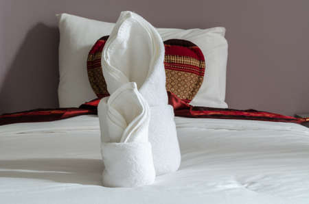 rolled bath towels at hotelの写真素材