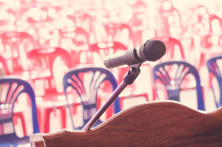 Close up of the vintage old microphone in conference roomの写真素材