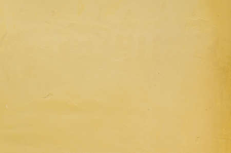 Yellow concerte wall texture and backgrounの写真素材