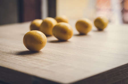 fresh date palm fruits  on wooden background: Vintage styleの写真素材