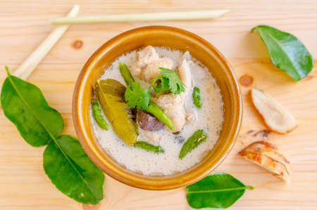 Thai Chicken Soup in Coconut Milk (Tom Kha Gai) on wooden background, thai food.の写真素材